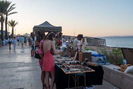 Es Pujols, Formentera, Spain: 2021 July 18: People in Es Pujols in Formentera in the Balearic...