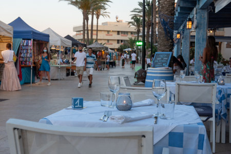 Es Pujols, Formentera, Spain: 2021 July 18: People in Es Pujols in Formentera in the Balearic Islands in Spain in the summer of 2021.のeditorial素材