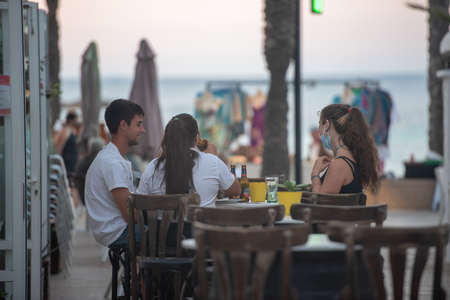 Es Pujols, Formentera, Spain: 2021 July 18: People in Es Pujols in Formentera in the Balearic Islands in Spain in the summer of 2021.のeditorial素材