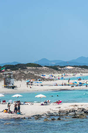 Formentera, Spain: 2021 July 05: People in the Levante beach in Formentera, Spain in summer 2021.のeditorial素材