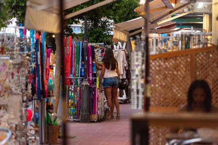 Es Pujols, Formentera, Spain. 2021 July 23. Family enjoying summer in Formentera in times of covid19 in 2021.のeditorial素材