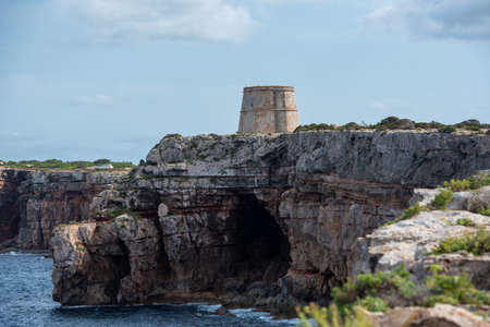 Sunny morning at Torre de sa Punta Prima on the Island of Formentera, Spain.の写真素材