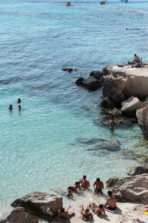 Formentera, Spain: 2021 June 04: People in Formentera beach of Calo d es Mort in Balearic Islands in summer 2021のeditorial素材