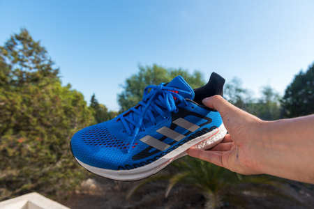 Barcelona, Spain: 2021 September 11: Adidas Solar Boast 3 sneakers with a natural fordo in summer 2021.のeditorial素材
