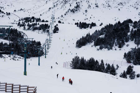 Grandvalira, Andorra: January 2021: People skiing in the Grandvalira Pyrenees station in winter 2021...