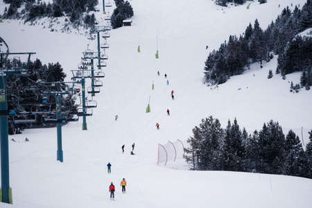 Grandvalira, Andorra: January 2021: People skiing in the Grandvalira Pyrenees station in winter 2021 - 2021.のeditorial素材