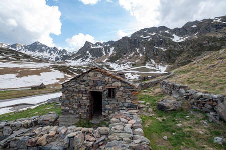 Rural cabin with the typical dry stone wall in Arcalis, Ordino in Andorraの写真素材