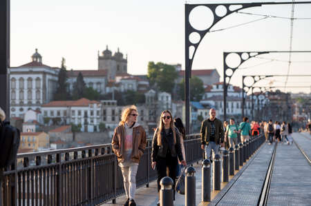 Port, Portugal. 2022 05 May . People on the Bridge over the Douro Luis II River in Porto, Portugal in Summer 2022.のeditorial素材