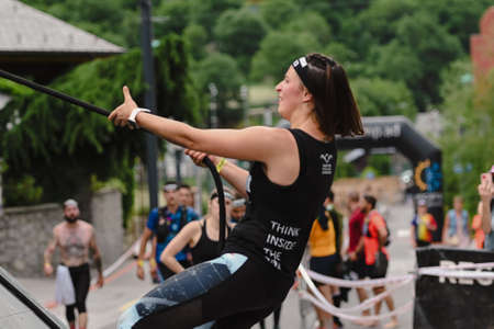 Encamp, Andorra : 2022 June 11 : Competitors participate in the 2020 Spartan Race obstacle racing...