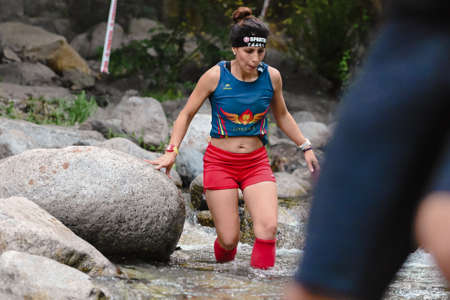 Encamp, Andorra : 2022 June 11 : Competitors participate in the 2020 Spartan Race obstacle racing...