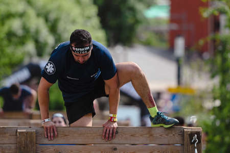 Encamp, Andorra : 2022 June 11 : Competitors participate in the 2020 Spartan Race obstacle racing challenge in Andorra, on June 11, 2022.のeditorial素材