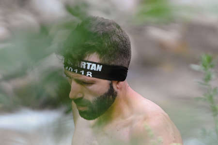 Encamp, Andorra : 2022 June 11 : Competitors participate in the 2020 Spartan Race obstacle racing...