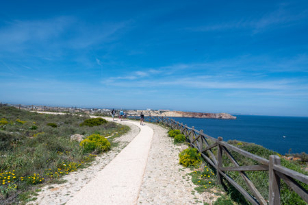 Sagres, Portugal. 2022 May 7 . People walking through the Fortaleza de Sangre in the Algarve, Portugal in summer.のeditorial素材