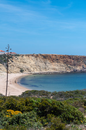 Sagres, Portugal. 2022 May 7. People in Praia da Mareta in the tourist city of Sagres in the Algarve, Portugal in the summer of 2022.のeditorial素材