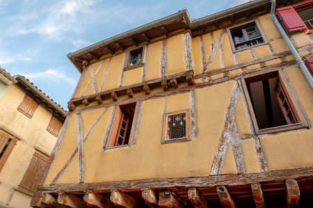 Old framework houses at main square of medieval village Mirepoix in southern France.