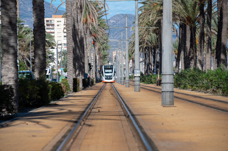 Alicante, Spain : 2022 November 17 : Alicante Metropolitan TRAM along the Paseo Maritimo de San Juan in Alicante in 2022.のeditorial素材