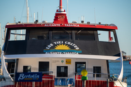 Alicante, Spain : 2022 November 18 : Ferry from Alicante to Tabarca on the Paseo Maritimo in the tourist city of Alicante in Spain in 2022.のeditorial素材