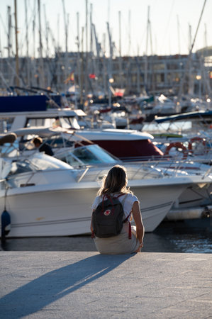 Alicante, Spain : 2022 November 18 : People at the Marina and Paseo Maritimo in the touristic city of Alicante in Spain in 2022.のeditorial素材