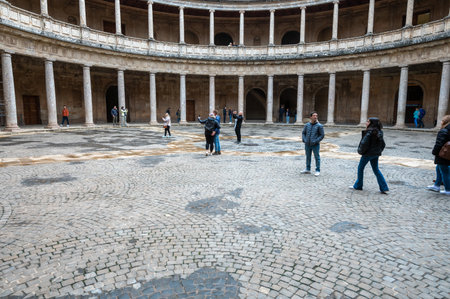 Granada, Spain : 2022 November 21 :People inside the Carlos V Palace in the Alhambra in Granada in 2022.のeditorial素材