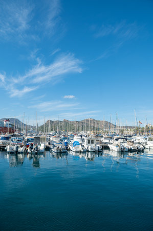 Cartagena, Spain : 2022 November 23 : Marina in the tourist city of Cartagena with moored boats in the autumn of 2022.のeditorial素材