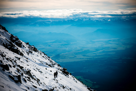 western carpathian mountain tops in winter covered in snow on a sunny day. slovakiaの写真素材