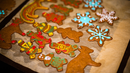 Making Gingerbread Cookies Series.  Ready cookies on the plate.