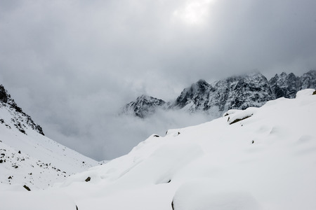 western carpathian mountain tops in winter covered in snow on a sunny day. slovakia