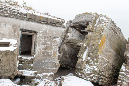 old war fort ruins on the beach in winter. Liepaja, Latviaの写真素材