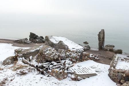 old war fort ruins on the beach in winter. Liepaja, Latviaの写真素材
