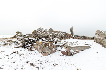 old war fort ruins on the beach in winter. Liepaja, Latviaの写真素材