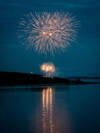 Firework festival on the Baltic seashore in the nightの写真素材