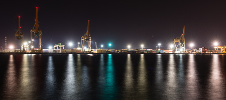 night city reflections in river, Riga, Latviaのeditorial素材