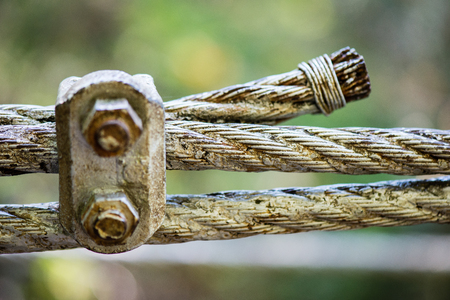 Rusty painted steel cable, bad condition. close up