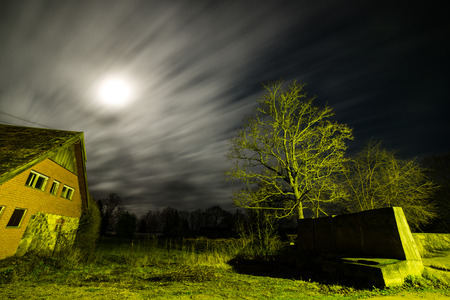 long exposure with clouds over the city at nightの写真素材