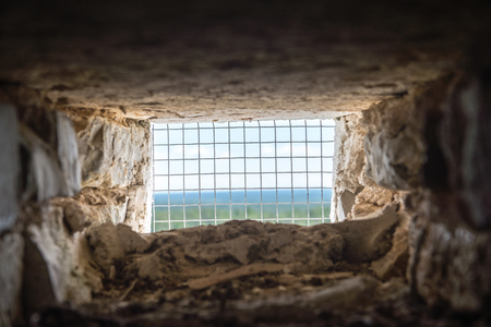 A spiral staircase inside a old wooden lighthouse.の写真素材