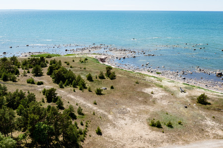 comfortable beach of the baltic sea with rocks and green vegetation in summer. aerial view.の写真素材