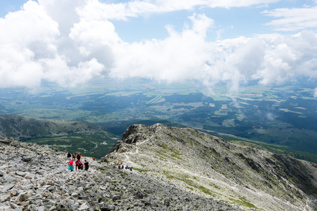 rocky mountain landscape covered with clouds and fog. High Tatra, Slovakiaの写真素材