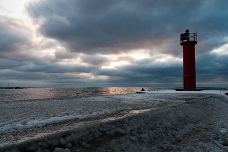 frozen countryside scene in winter with snow. beach scene with ice blocksの写真素材