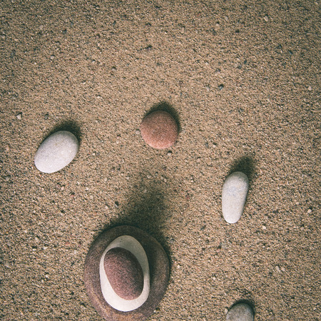 zen garden sand waves and rock sculptures - instant vintage square photoの写真素材
