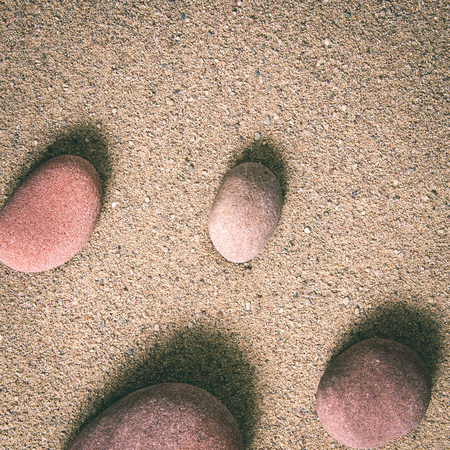 zen garden sand waves and rock sculptures - instant vintage square photoの写真素材