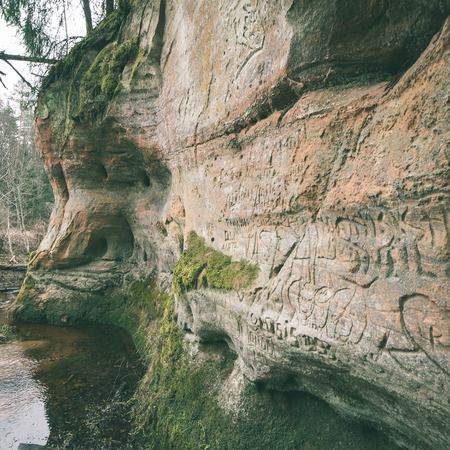 sandstone cliffs on the river shore in the Gaujas National Park, Latvia - instant vintage square photoの写真素材
