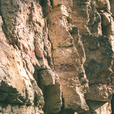 sandstone cliffs with water source. latvia. - instant vintage square photoの写真素材