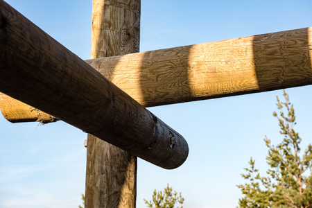 details of wooden watch tower deep in country forest with metal boltsの写真素材