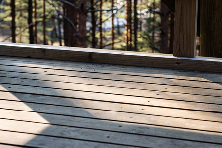 details of wooden watch tower deep in country forest with metal boltsの写真素材