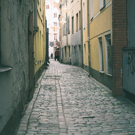 architectural details in spring of old city center in Riga, Latvia - instant vintage square photoの写真素材