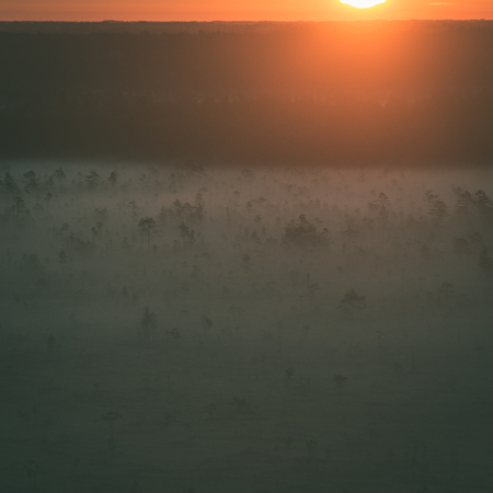 Foggy colorful morning above fields in countryside - instant vintage square photoの写真素材