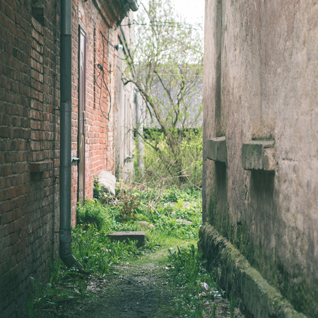 architectural details in spring of old city center, Latvia - instant vintage square photo