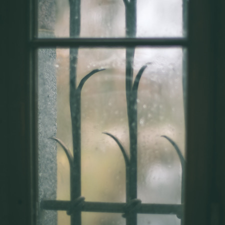 interior of an old castle with stairs and windows. detail shot. - instant vintage square photoの写真素材