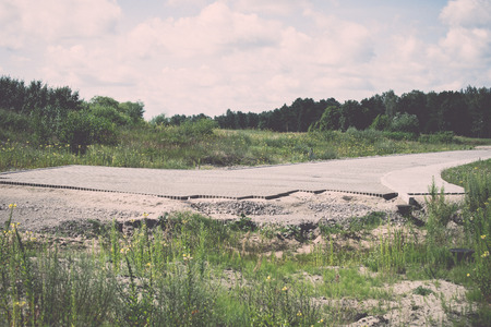 road construction site in the meadow - retro, vintage style lookの写真素材