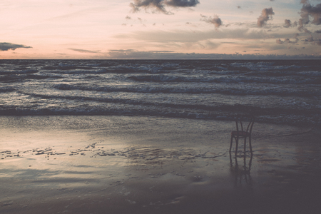 chair in the sea - retro, vintage style lookの写真素材